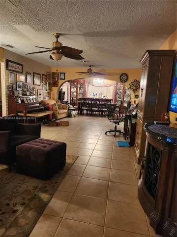 a room with lots of appliances and furniture