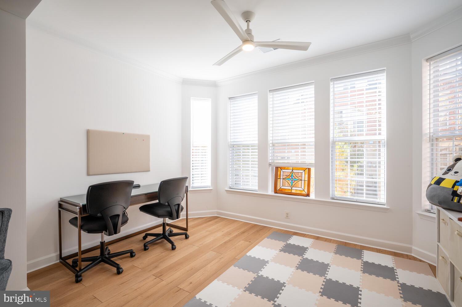 10328 Sager Avenue, Unit 217 Fairfax, VA 22030 - Photo 13 of 42 a view of a workspace with furniture and a window