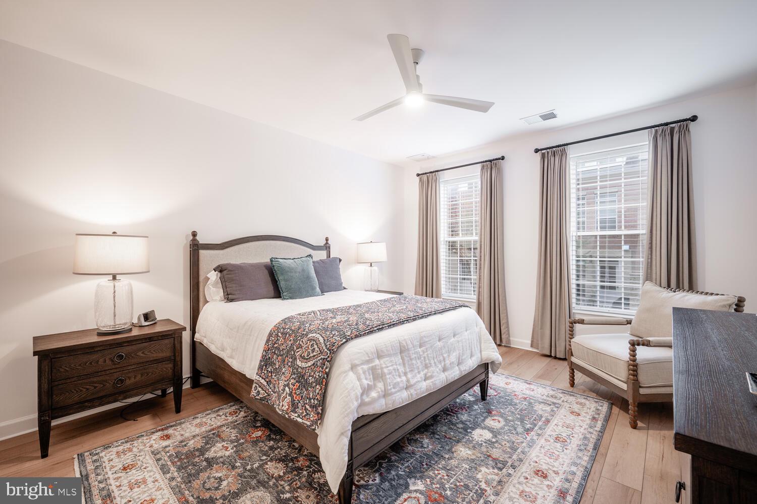 10328 Sager Avenue, Unit 217 Fairfax, VA 22030 - Photo 16 of 42 a bedroom with a bed and a window