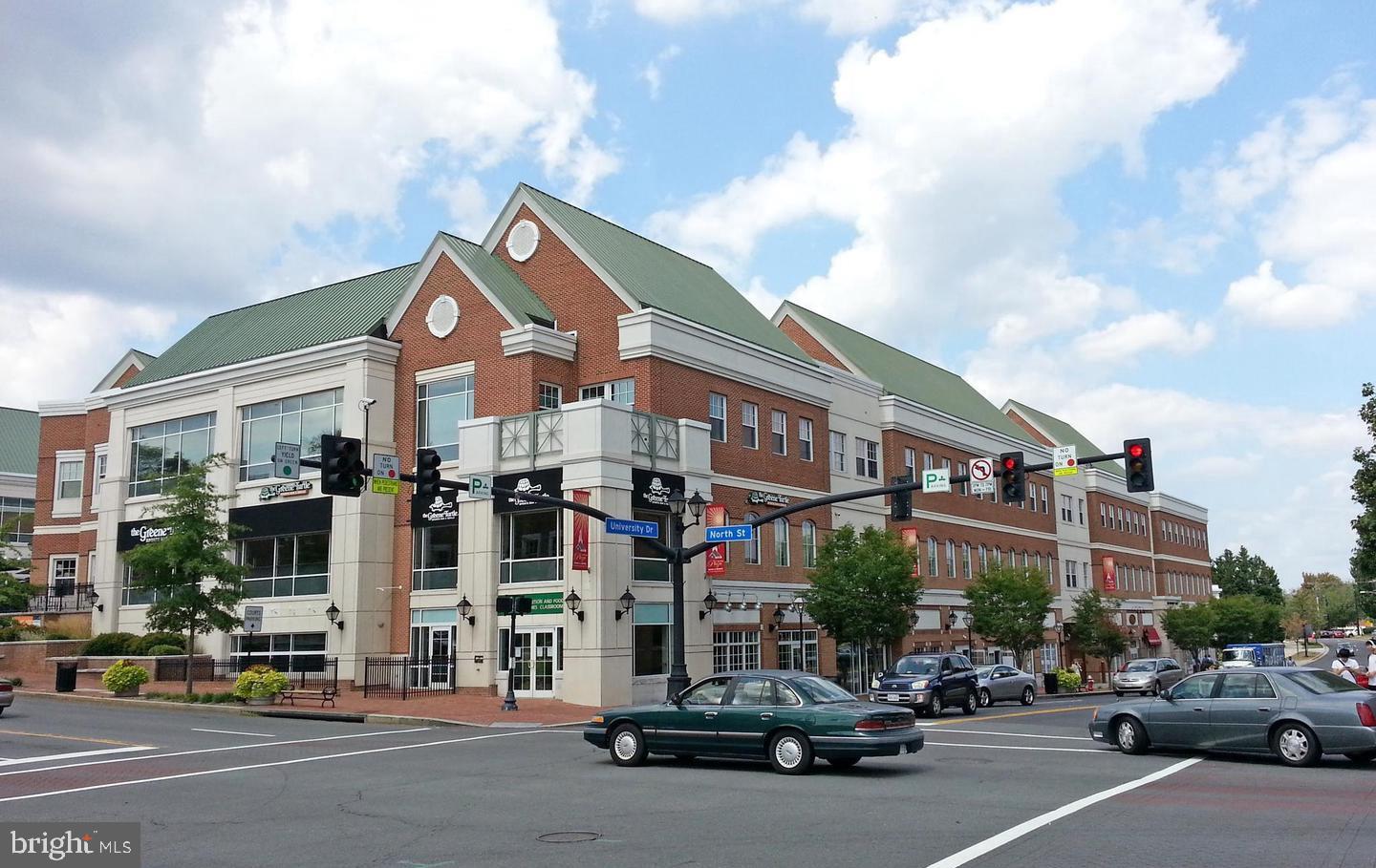 10328 Sager Avenue, Unit 217 Fairfax, VA 22030 - Photo 34 of 42 a car parked in front of a building
