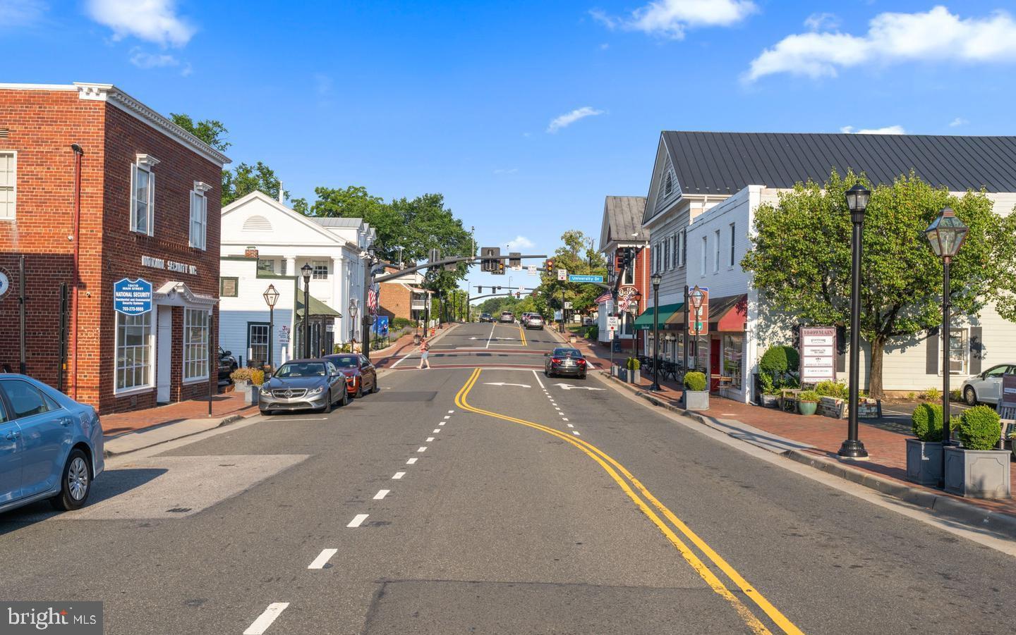 10328 Sager Avenue, Unit 217 Fairfax, VA 22030 - Photo 35 of 42 a view of a street with cars