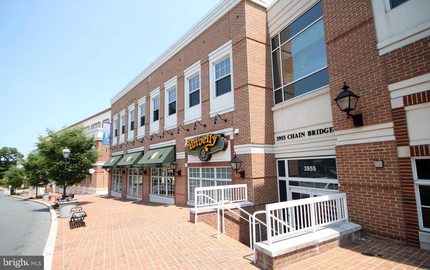 10328 Sager Avenue, Unit 217 Fairfax, VA 22030 - Photo 37 of 42 a view of a building with iron fence