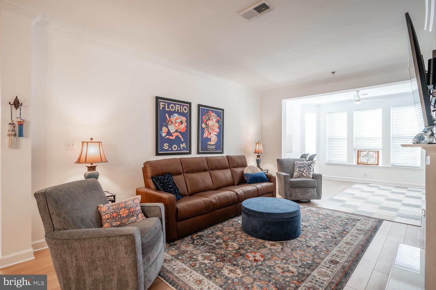 10328 Sager Avenue, Unit 217 Fairfax, VA 22030 - Photo 10 of 42 a living room with furniture and a large window