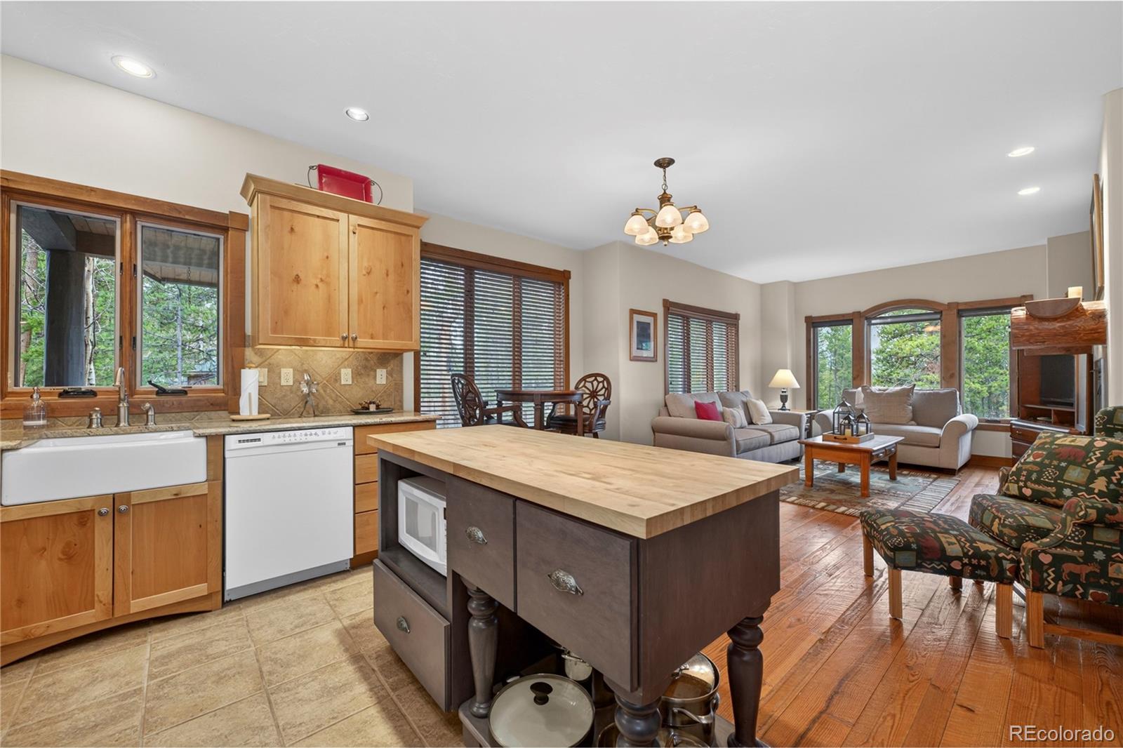 148 County Road Tabernash, CO 80478 - Photo 17 of 45 a large kitchen with sink a refrigerator and chairs