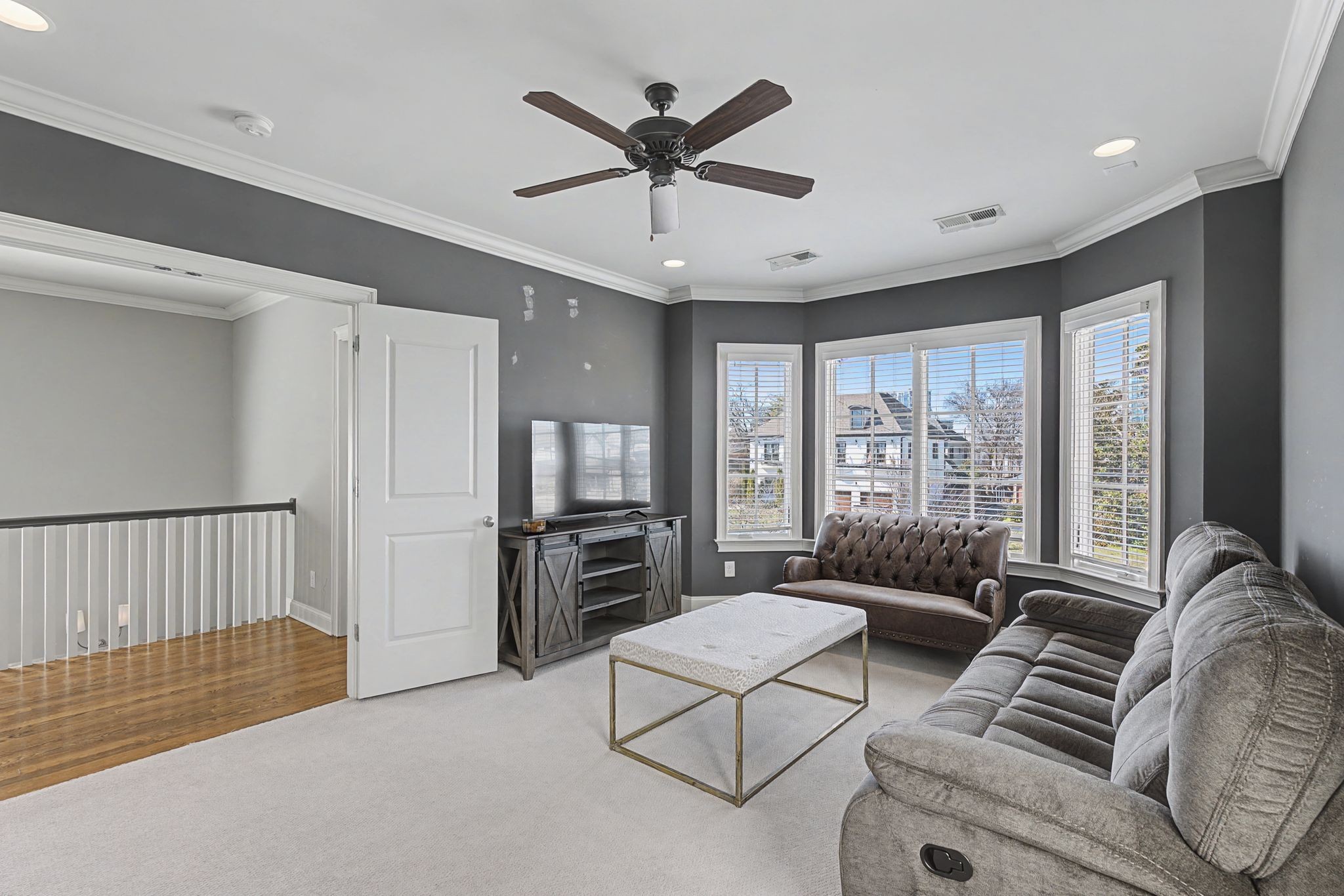 4108 A Lone Oak Road Nashville, TN 37215 - Photo 20 of 36 a living room with furniture ceiling fan and a window