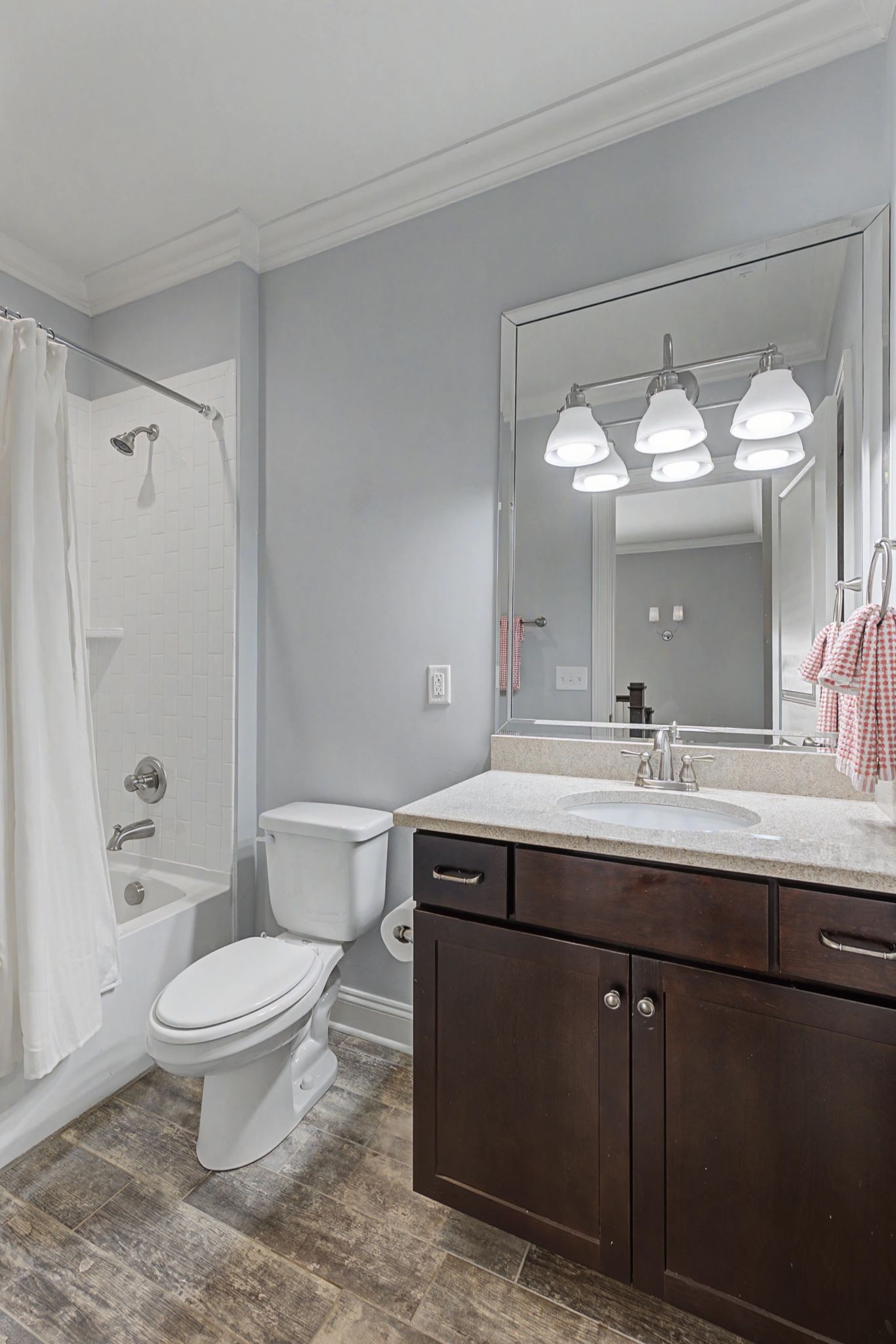 4108 A Lone Oak Road Nashville, TN 37215 - Photo 21 of 36 a bathroom with a granite countertop sink a toilet and a mirror
