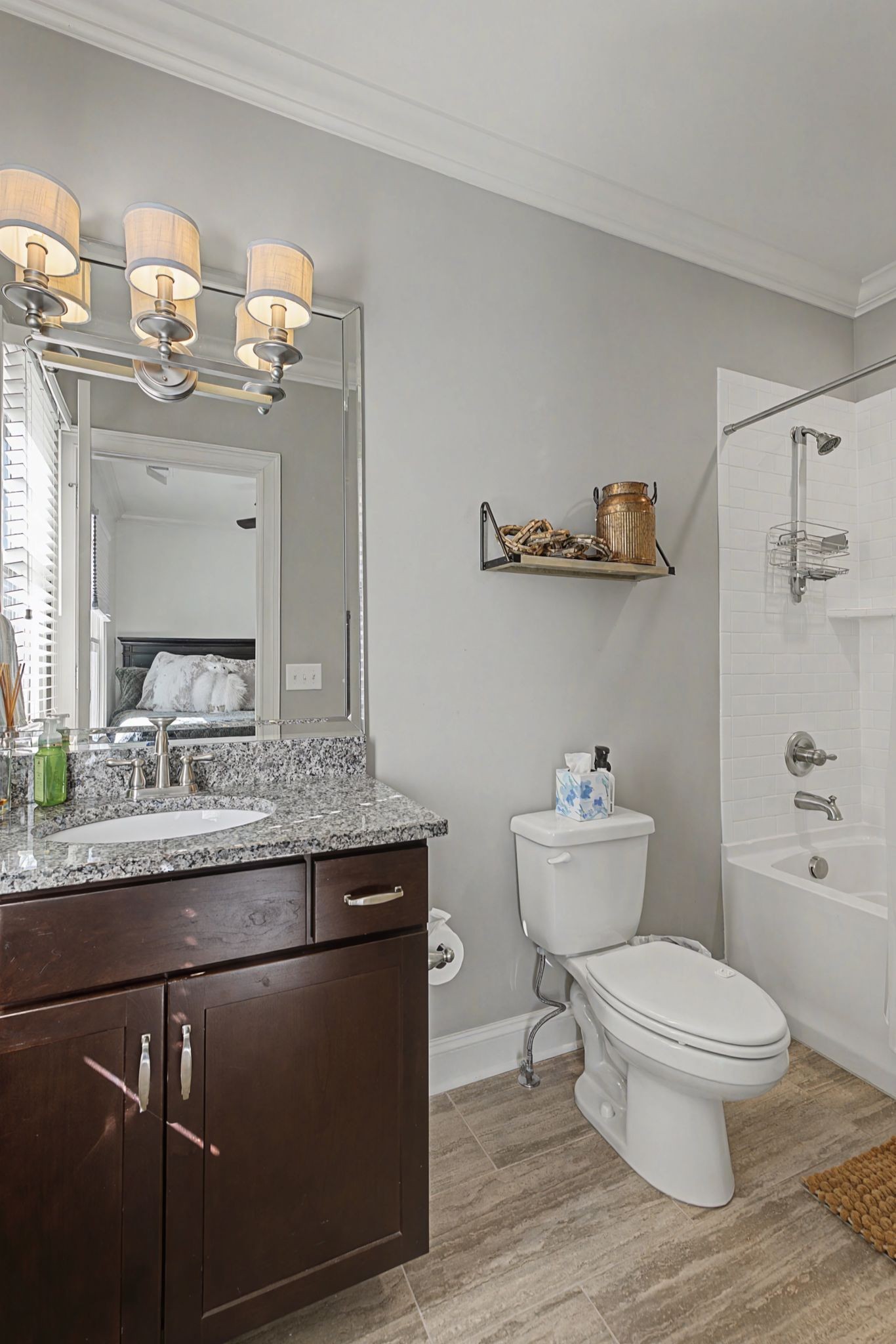 4108 A Lone Oak Road Nashville, TN 37215 - Photo 23 of 36 a bathroom with a granite countertop toilet sink and mirror