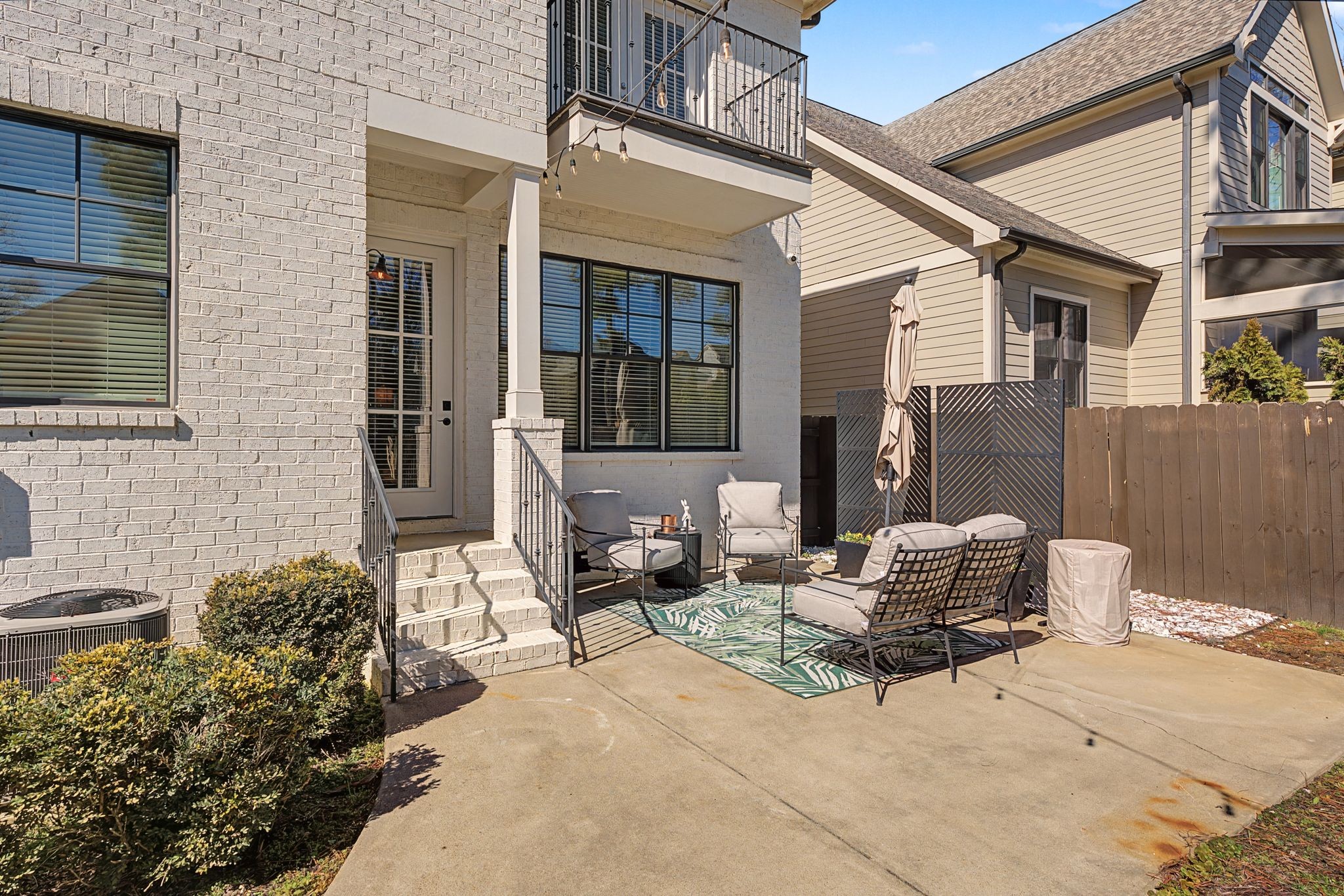 4108 A Lone Oak Road Nashville, TN 37215 - Photo 32 of 36 a view of a patio with couple of chairs and potted plants