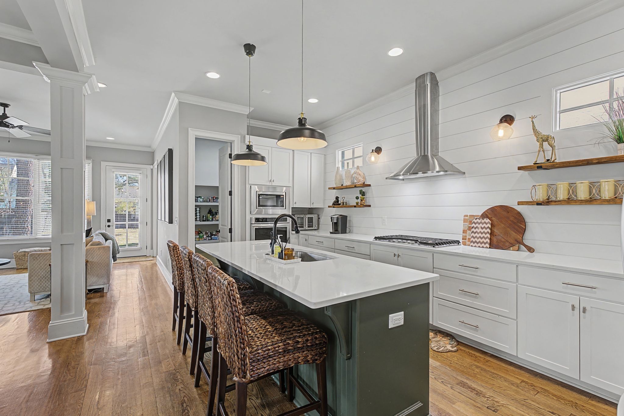 4108 A Lone Oak Road Nashville, TN 37215 - Photo 8 of 36 a kitchen with stainless steel appliances granite countertop a sink a stove a refrigerator and island with wooden floor