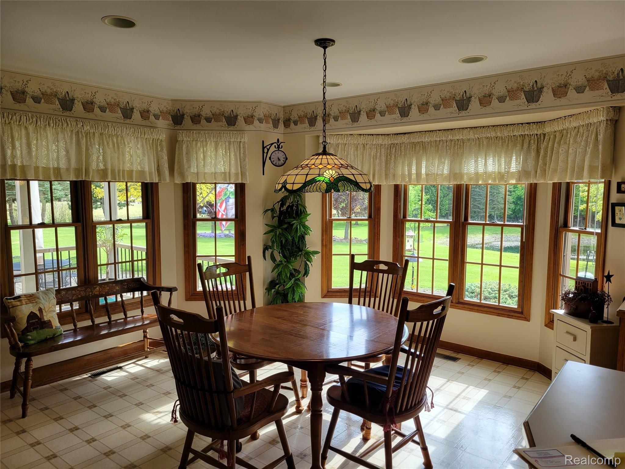 567 North Summers Road Imlay City, MI 48444 - Photo 39 of 77 A great view of the grounds from the dining area.