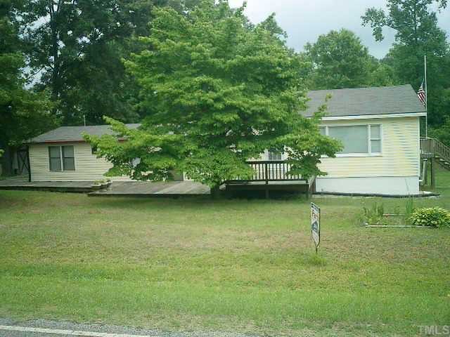 327 Thomas Gay Road Spring Hope, NC 27882 - Photo 1 of 1 a view of a house with a backyard
