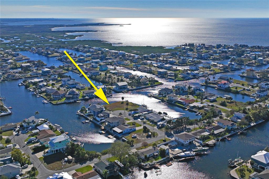 8 6th Isle Drive Hernando Beach, FL 34607 - Photo 6 of 12 an aerial view of residential houses with outdoor space
