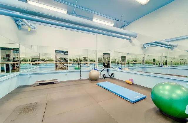 a view of a room with gym equipment