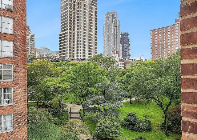 a view of a city with tall buildings