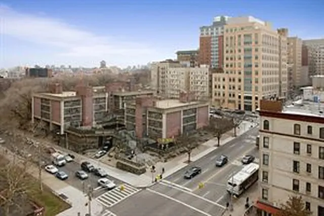 a bathroom with a sink toilet and mirror