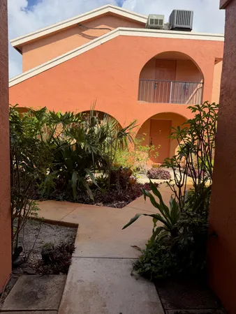 a view of a yard in front of a house