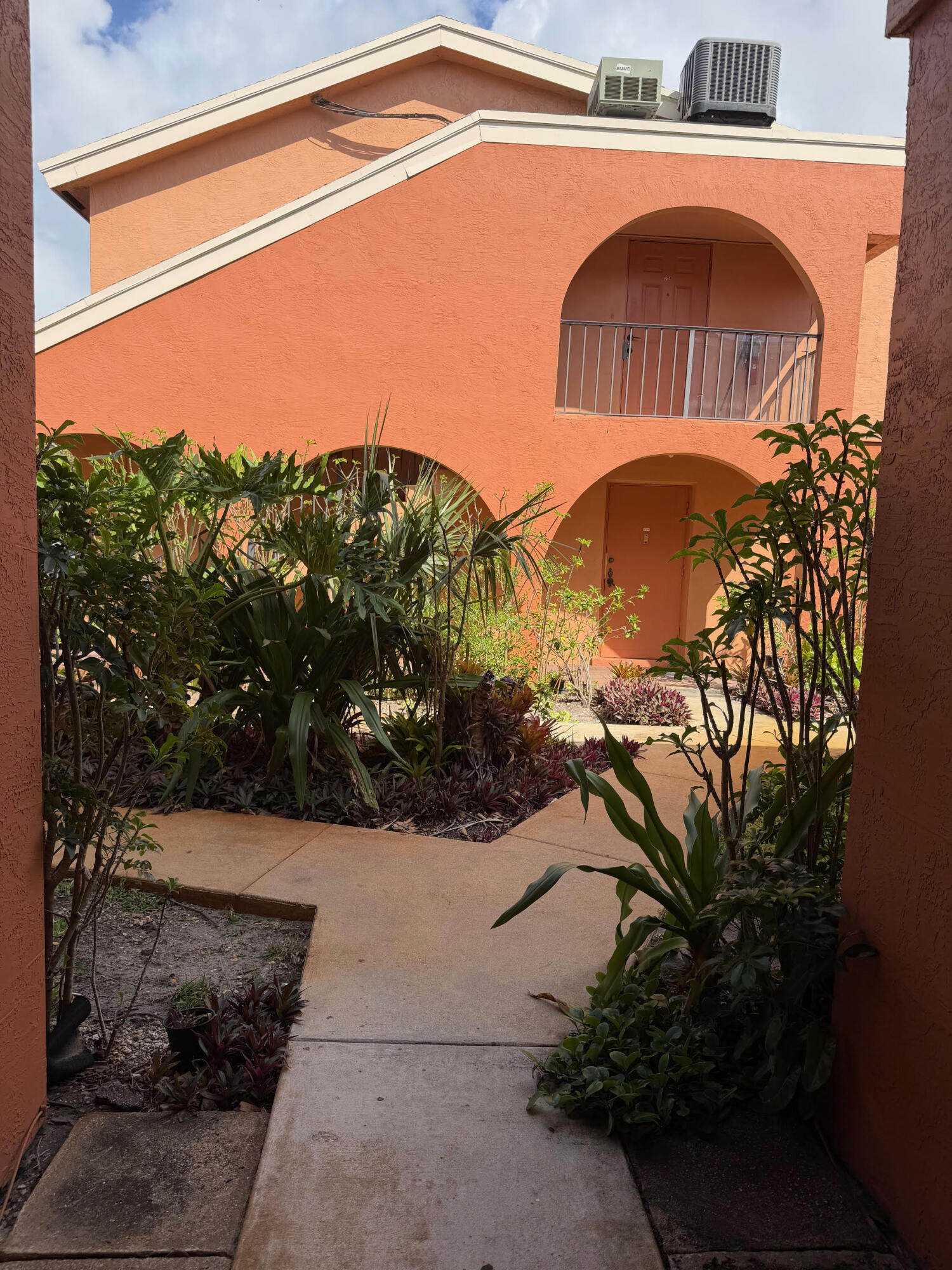 50 Southeast 12th Street, Unit 1520 Boca Raton, FL 33432 - Photo 12 of 14 a view of a yard in front of a house