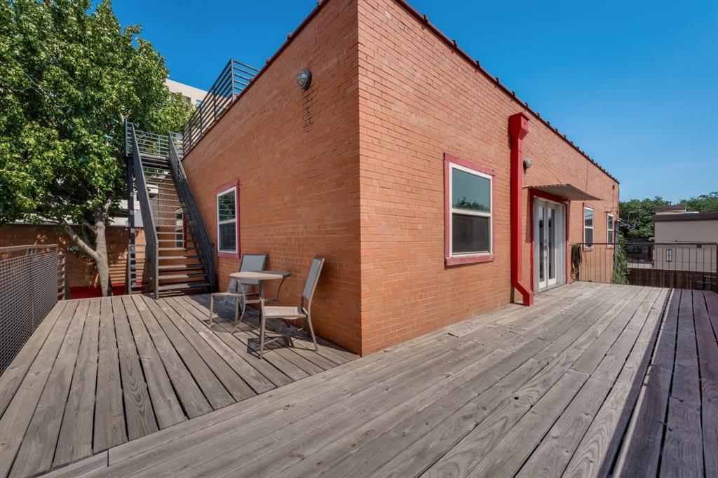 2700 Live Oak Street, Unit 101 Dallas, TX 75204 - Photo 12 of 29 a balcony view with a seating space