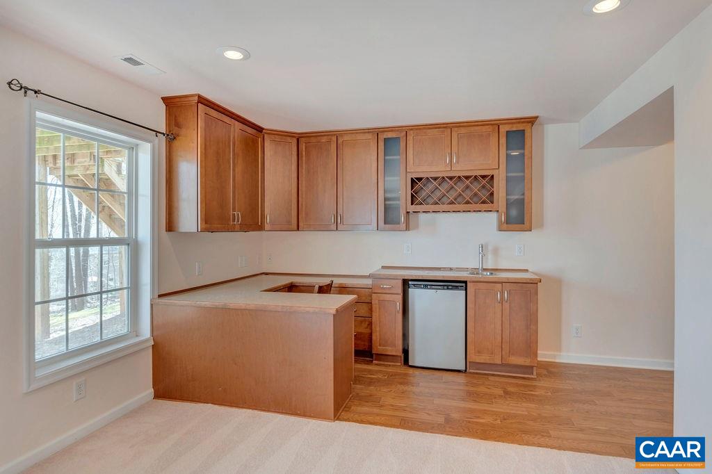 38 Riverside Drive Palmyra, VA 22963 - Photo 27 of 50 a view of a kitchen with a sink dishwasher and a microwave