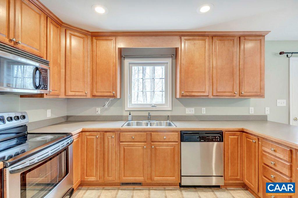 38 Riverside Drive Palmyra, VA 22963 - Photo 8 of 50 a kitchen with stainless steel appliances granite countertop a sink stove and cabinets