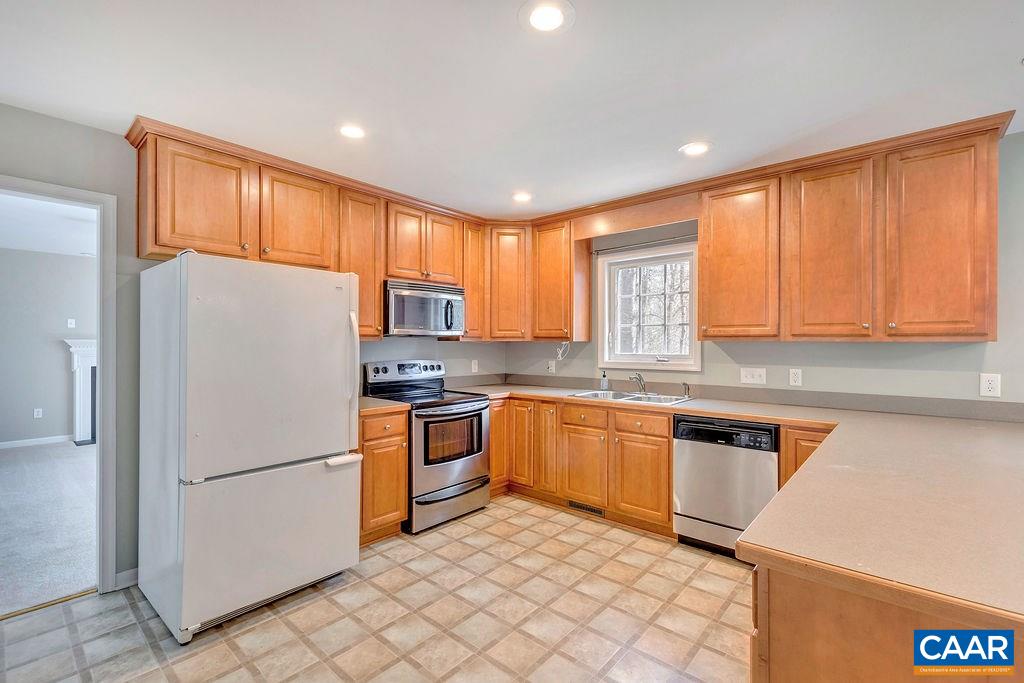 38 Riverside Drive Palmyra, VA 22963 - Photo 9 of 50 a kitchen with granite countertop stainless steel appliances a refrigerator cabinets and a sink