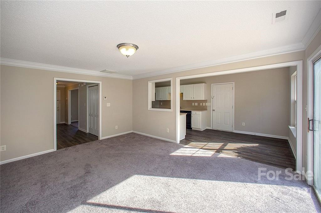 881 Raindrops Road Gastonia, NC 28054 - Photo 17 of 25 a view of empty room with windows