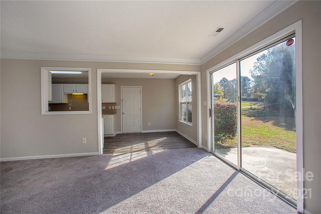 881 Raindrops Road Gastonia, NC 28054 - Photo 18 of 25 a view of an empty room and window