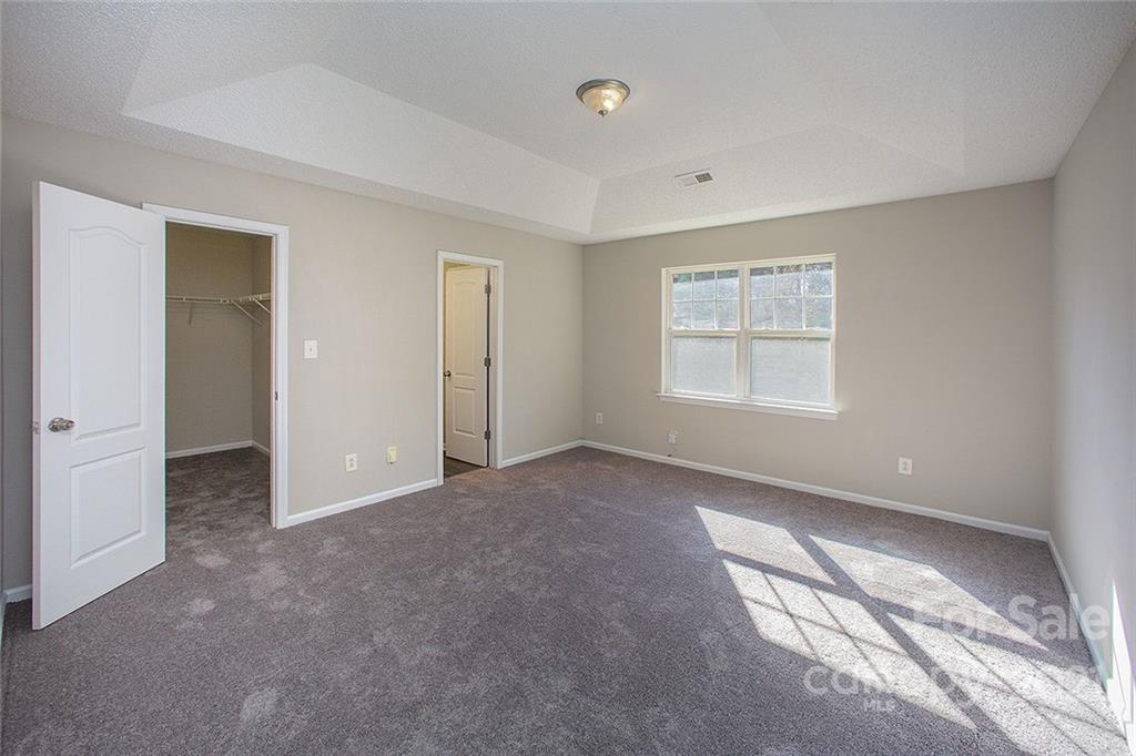 881 Raindrops Road Gastonia, NC 28054 - Photo 21 of 25 a view of an empty room with a window