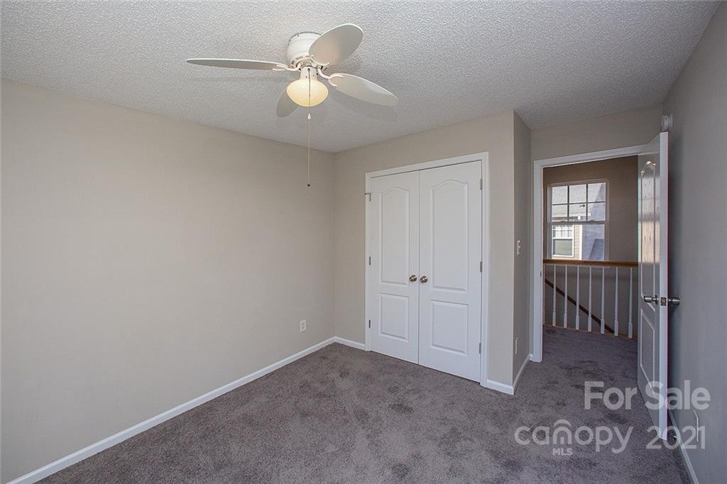 881 Raindrops Road Gastonia, NC 28054 - Photo 23 of 25 a view of an empty room and a fan
