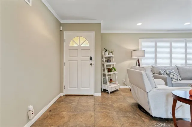 a bedroom with bed and wooden floor