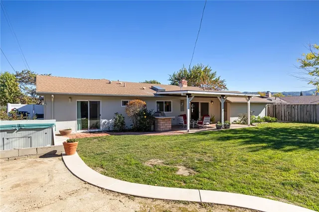 an aerial view of houses with outdoor space