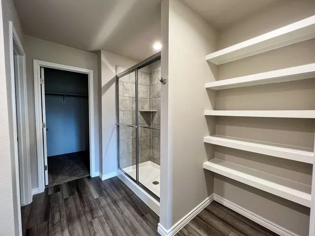 an empty room with windows