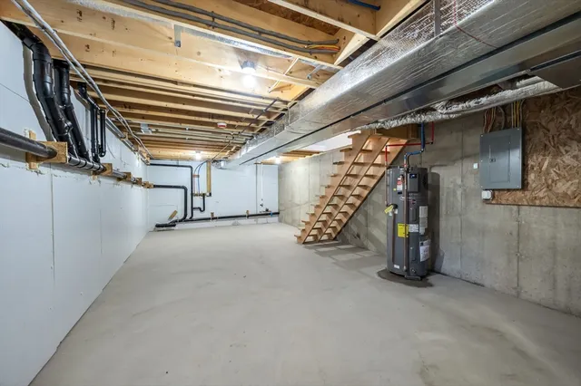 a view of an empty room with stairs