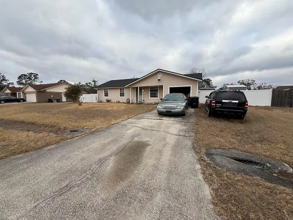 a car parked in front of a house