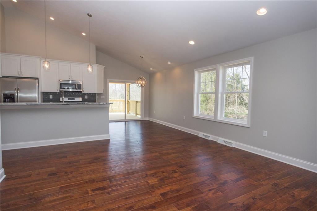 155 Spring Hill Road Aliquippa, PA 15001 - Photo 2 of 18 Walk into an open concept....living room, kitchen and dining area, with access to a cover deck!