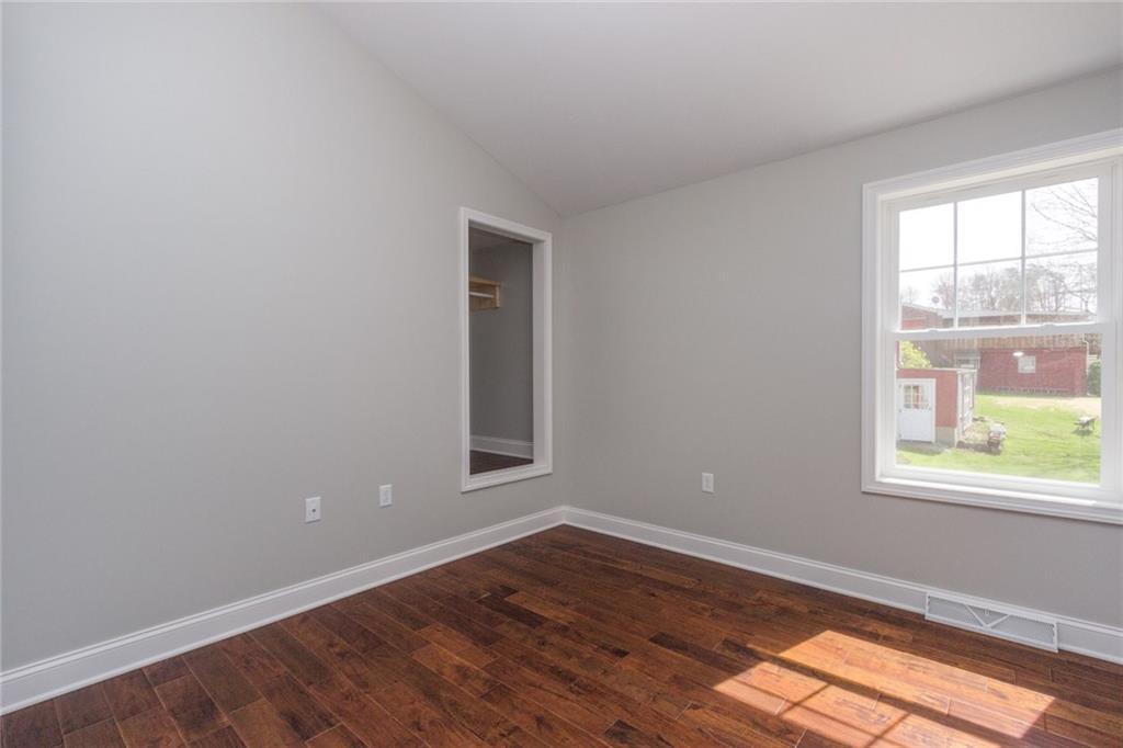 155 Spring Hill Road Aliquippa, PA 15001 - Photo 12 of 18 Bedroom number three, large closet on closest side of picture and additional closet space in view. Door on? Door off? you can decide!