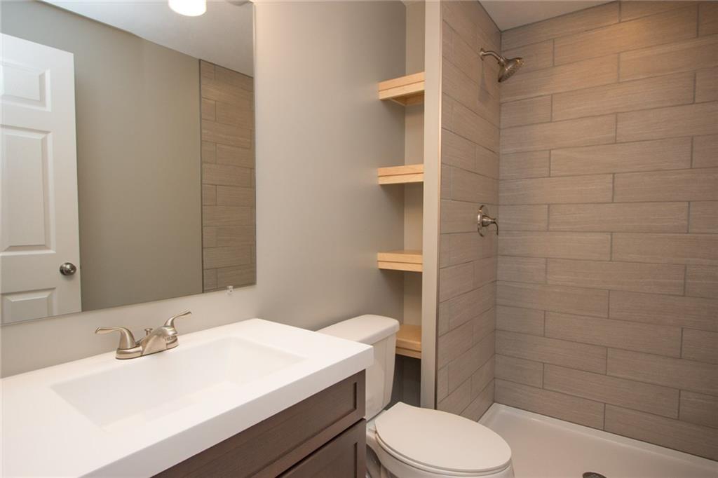 155 Spring Hill Road Aliquippa, PA 15001 - Photo 10 of 18 Magazine ready tiled shower, in the master bedroom.