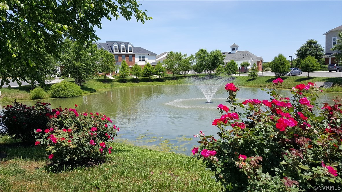 7390 Pebble Lake Drive, Unit 5 Mechanicsville, VA 23111 - Photo 1 of 23 a view of a flower in a garden