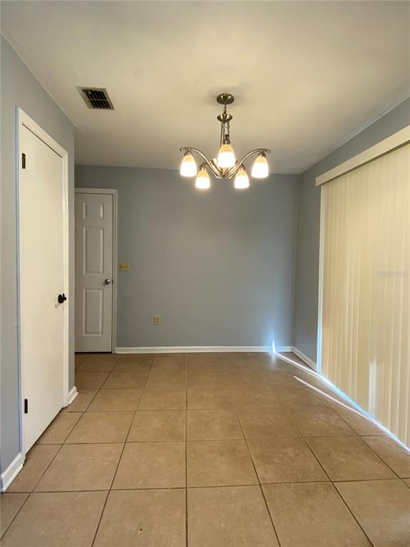 253 Northwest 3rd Street Micanopy, FL 32667 - Photo 17 of 22 a view of an empty room with a window