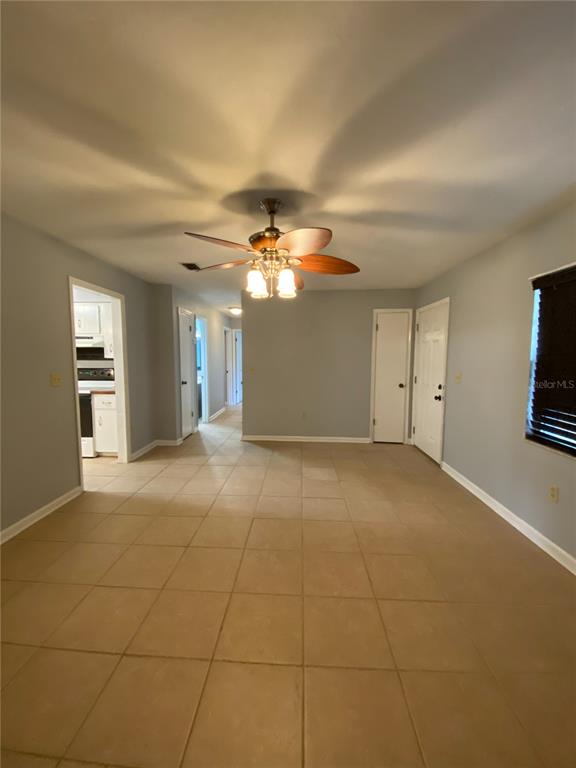 253 Northwest 3rd Street Micanopy, FL 32667 - Photo 4 of 22 a view of an empty room with a window