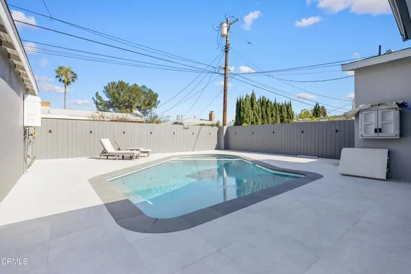 a view of a house with swimming pool