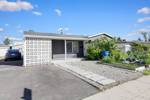a front view of a house with a garage
