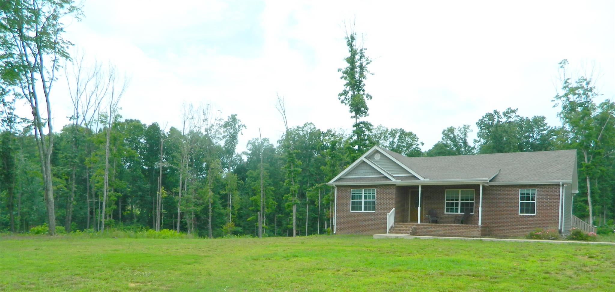 430 Kaiser Road Dickson, TN 37055 - Photo 1 of 13 a view of a house with a backyard