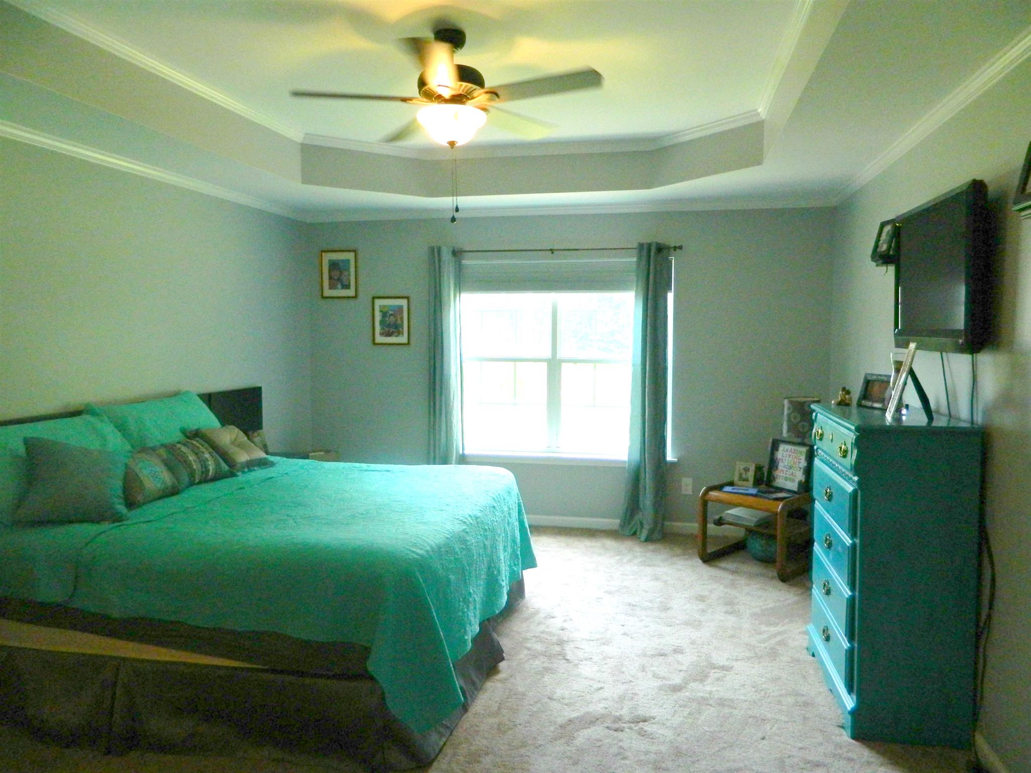 430 Kaiser Road Dickson, TN 37055 - Photo 12 of 13 a bedroom with a bed and a flat screen tv