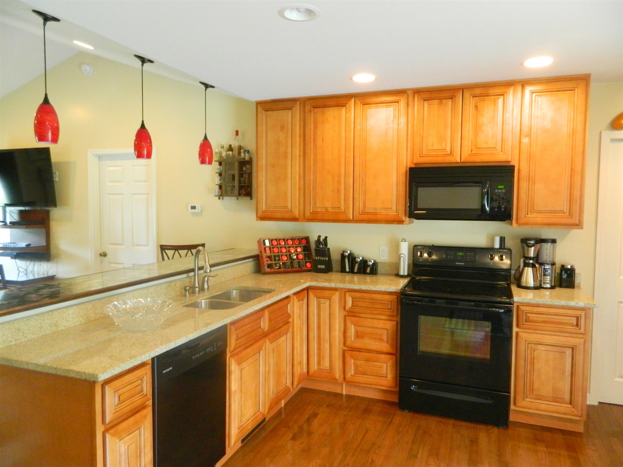 430 Kaiser Road Dickson, TN 37055 - Photo 7 of 13 a kitchen with a sink stove and refrigerator