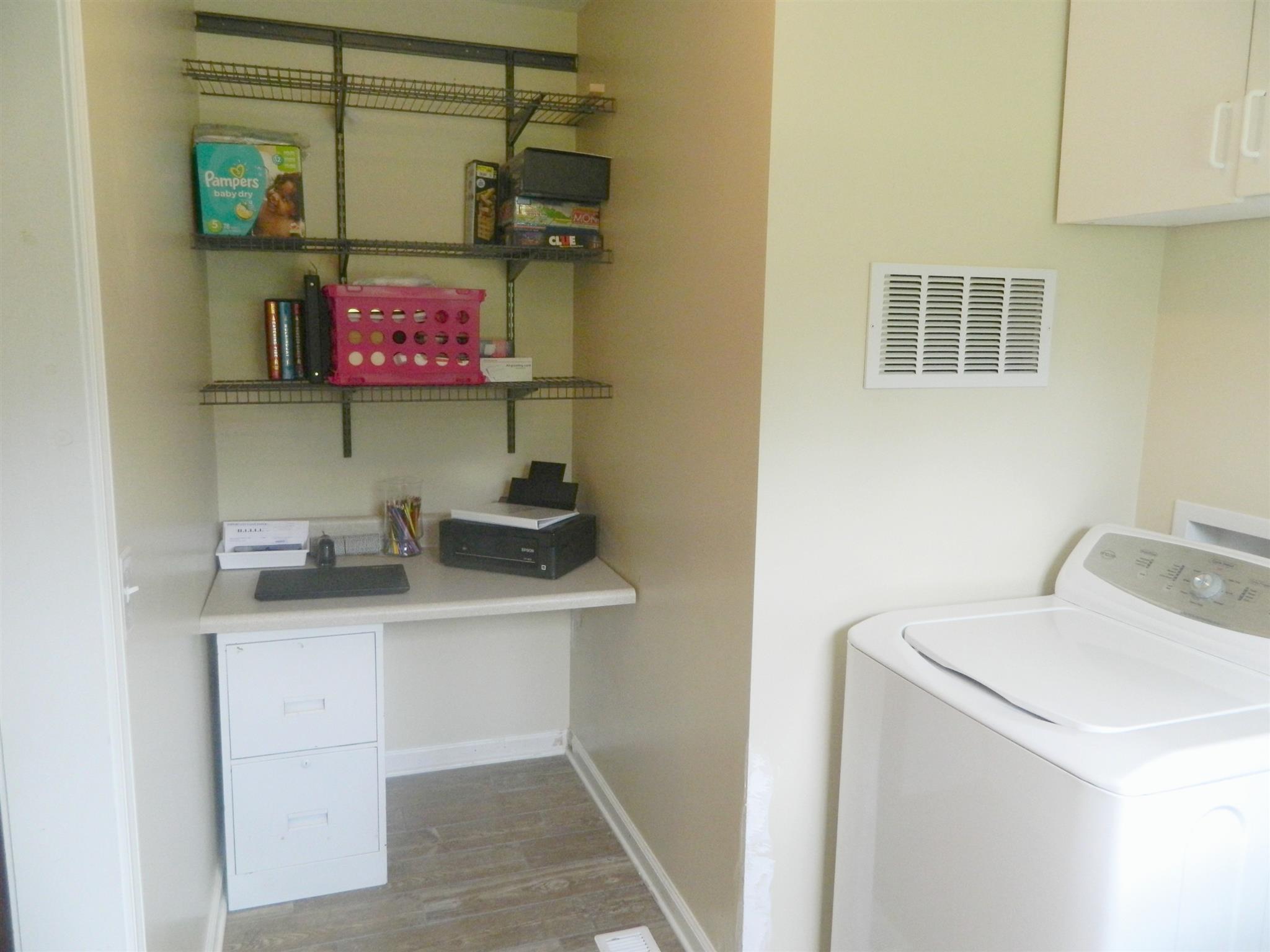 430 Kaiser Road Dickson, TN 37055 - Photo 8 of 13 a view of a storage & utility room with a sink