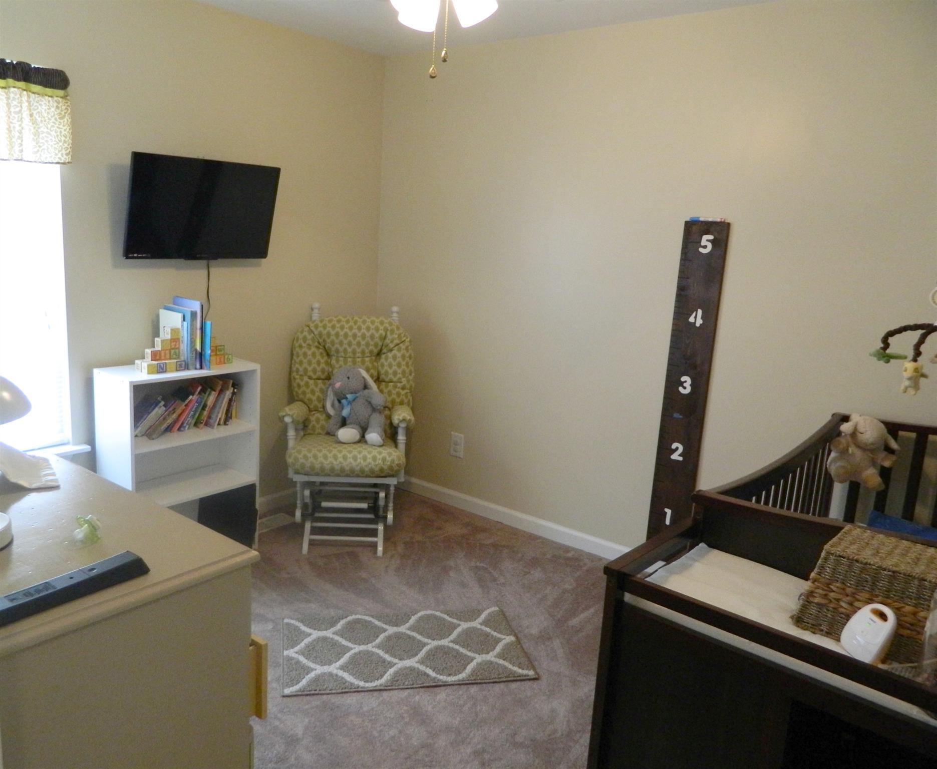 430 Kaiser Road Dickson, TN 37055 - Photo 9 of 13 a work room with furniture and a flat screen tv