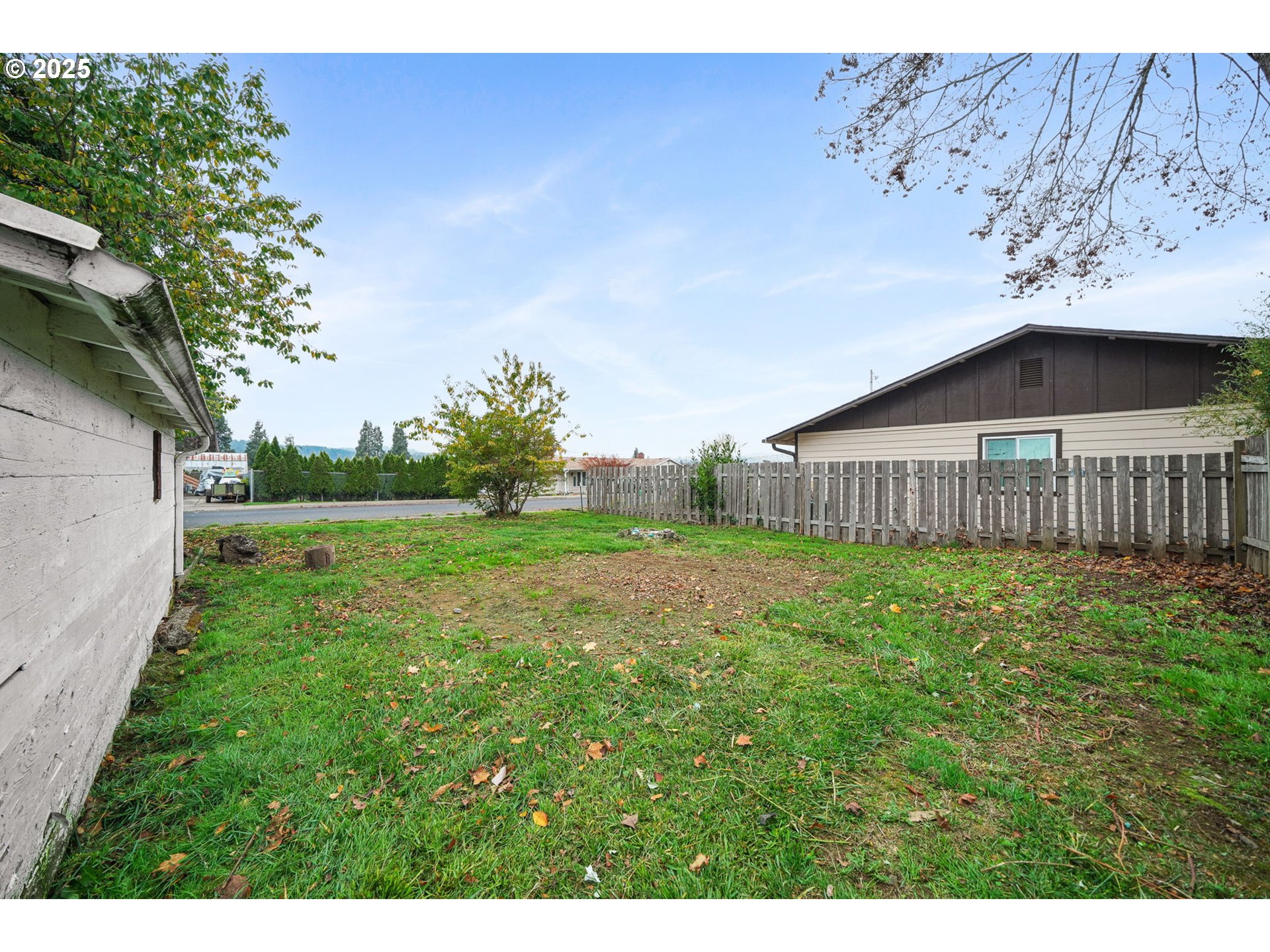 810 Johnson Avenue Cottage Grove, OR 97424 - Photo 17 of 17 a view of a house with backyard and garden
