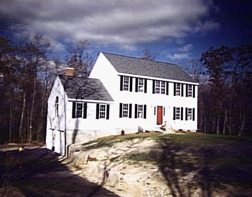 99 Haggerty Road Charlton, MA 01507 - Photo 1 of 1 a front view of a house with a yard