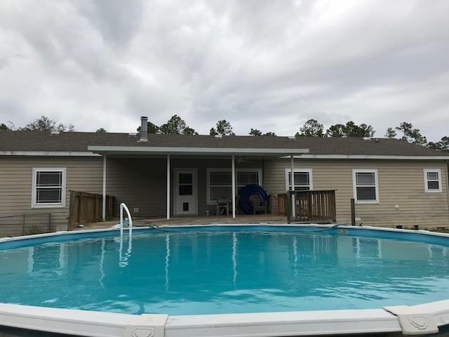 4036 Poverty Creek Road Crestview, FL 32539 - Photo 14 of 24 front view of house with a yard
